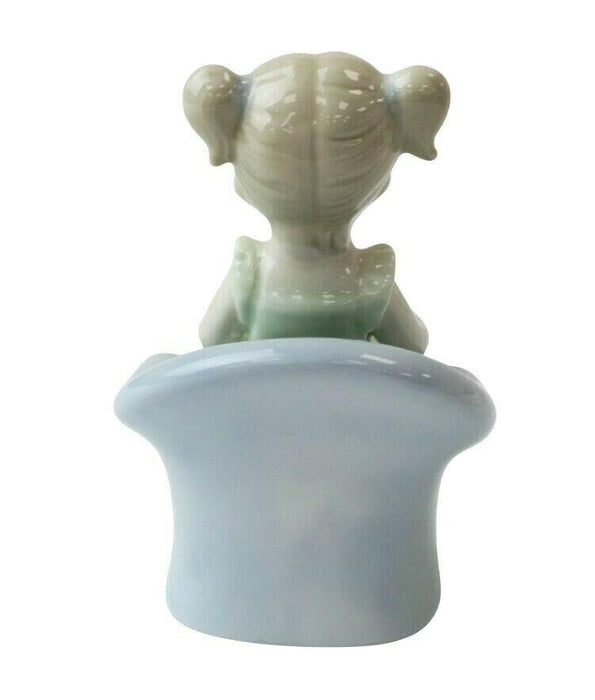 Little Girl Figurine - Young Child On Couch Small Porcelain Shelf Ornament 11cm
